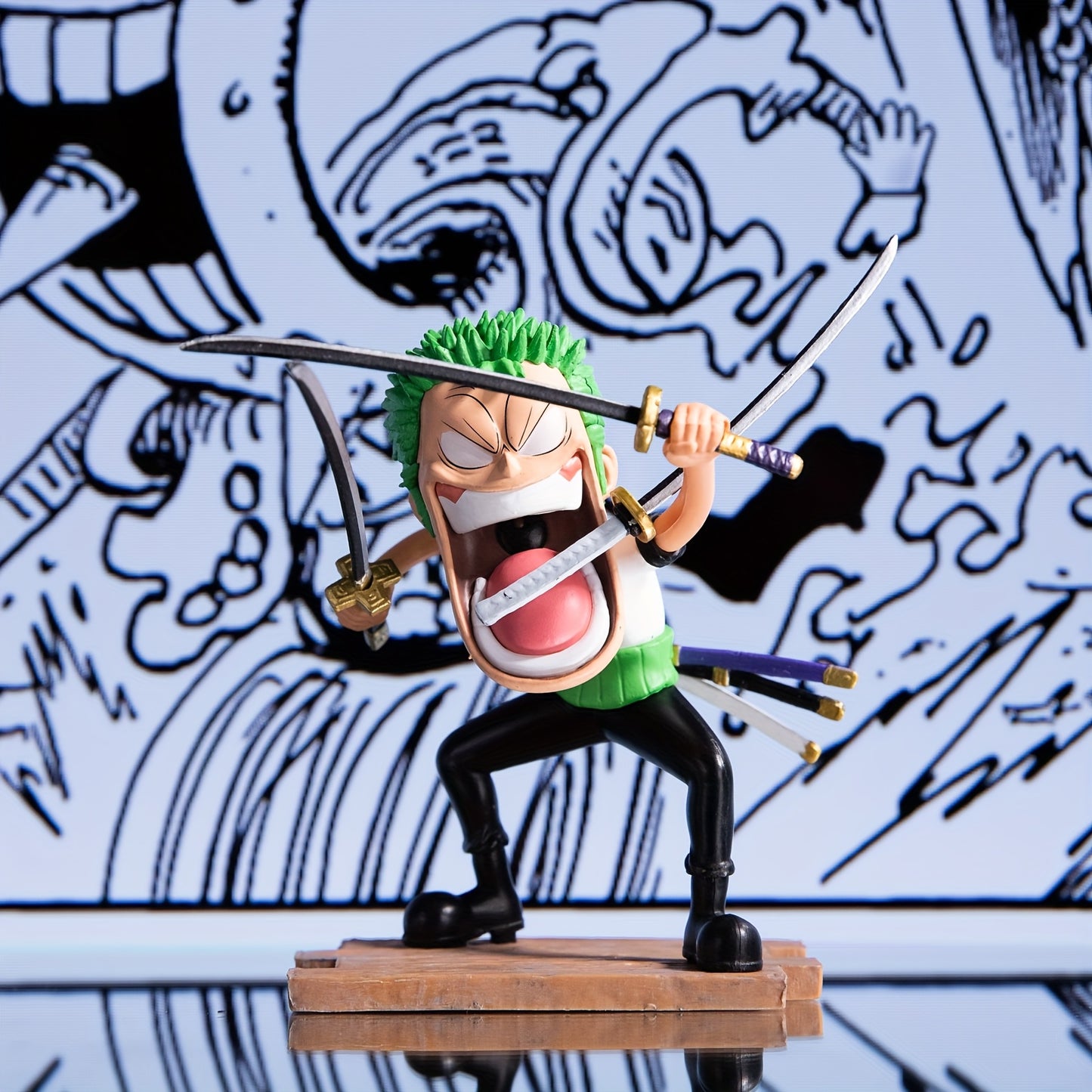 A set of 3 anime-related figurines, a three-person statue accessory,
