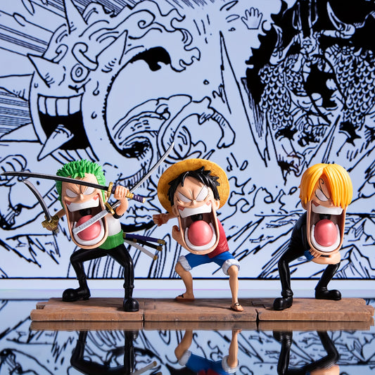 A set of 3 anime-related figurines, a three-person statue accessory,