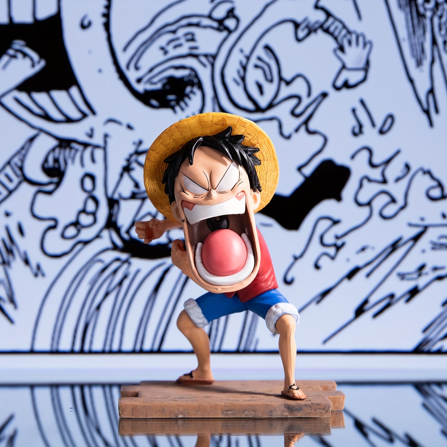 A set of 3 anime-related figurines, a three-person statue accessory,